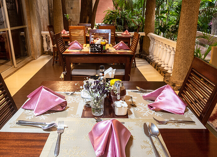 Outdoor garden dining at Comfort Gardens Nairobi
