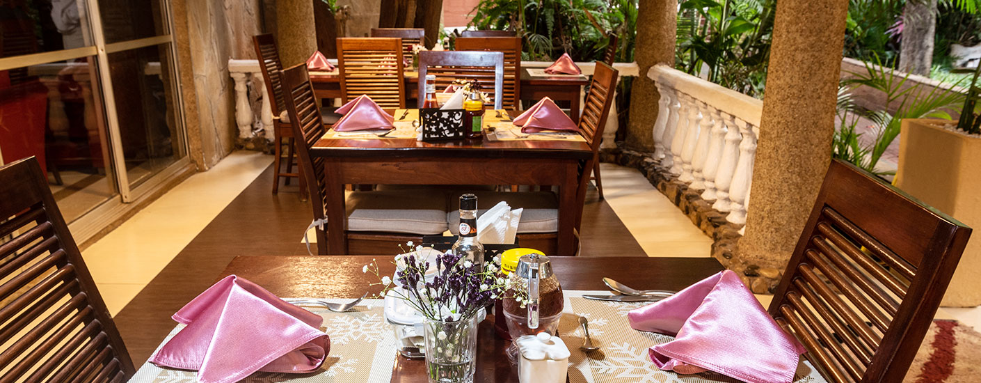 Outdoor garden dining at Comfort Gardens Nairobi