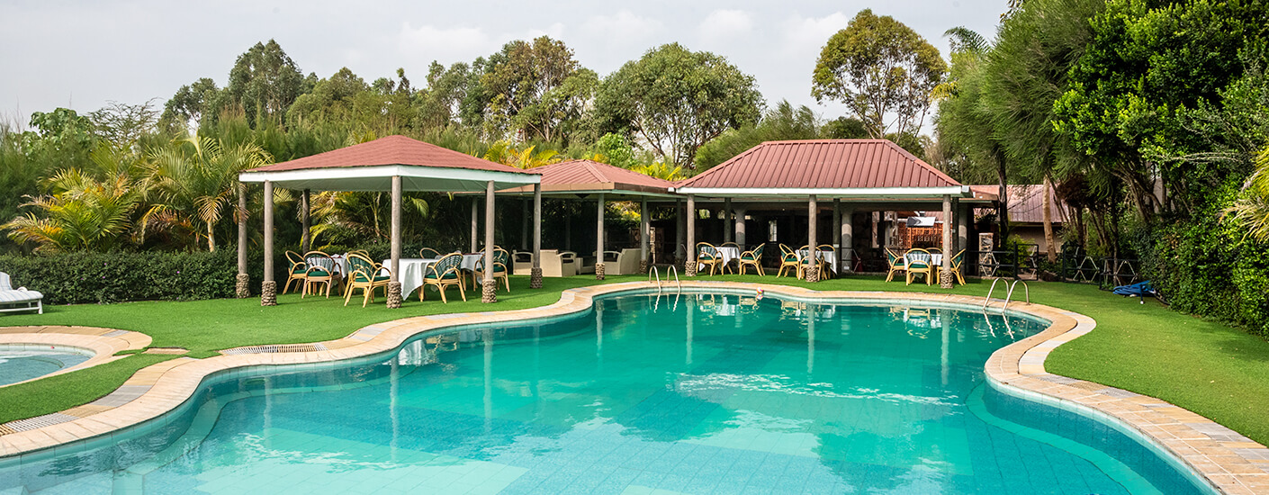 Comfort Gardens Nanyuki poolside restaurant dining area