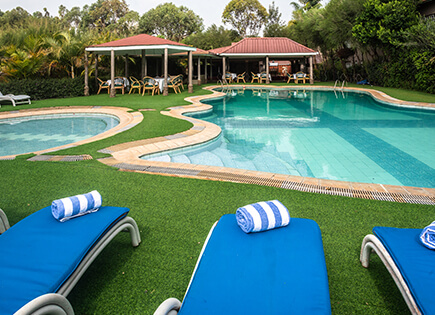 Comfort Gardens Nanyuki poolside dining area